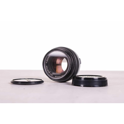 147 - A large collection of Olympus OM System camera lenses, comprising: Zuiko Auto-Macro 135mm F4.5, Zuik... 