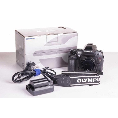 148 - A collection of Olympus Digital Camera items, all boxed with accessories, and apparently unused, com... 