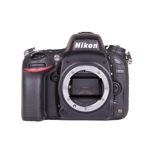 153 - A Nikon D600 digital camera body, boxed with battery, charger and carry strap, together with a Nikon... 