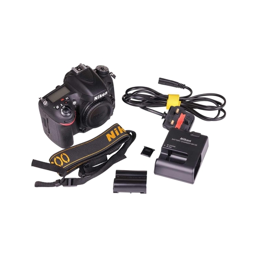 153 - A Nikon D600 digital camera body, boxed with battery, charger and carry strap, together with a Nikon... 