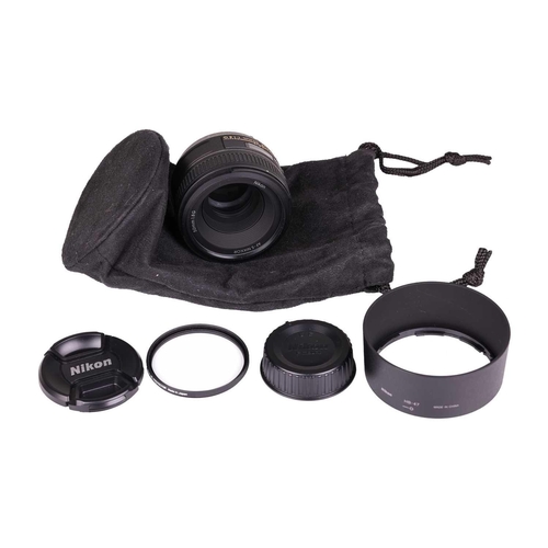 154 - A Nikon AF-S Nikkor Lens, 50mm f/1.8G, together with a Nikkor AF-S 35mm f/1.8 G ED, and a Nikon Wire... 