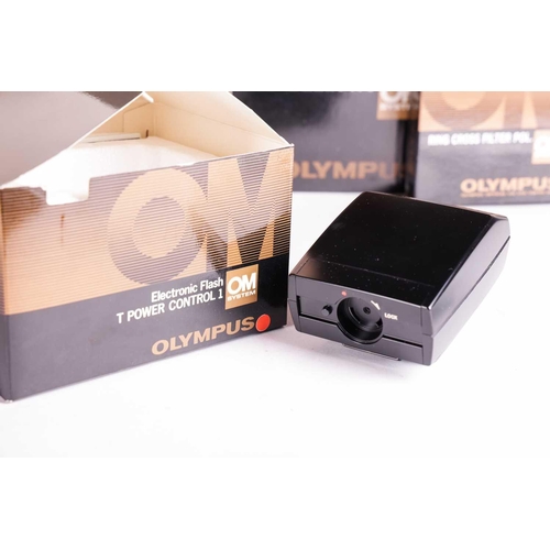 157 - A large collection of boxed Olympus OM System cameras and accessories, comprising: an OM-4 Ti camera... 