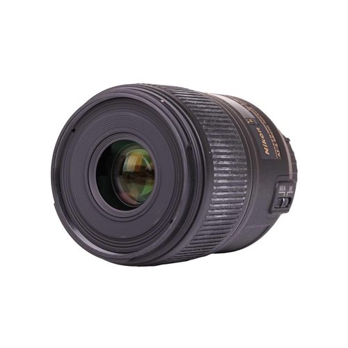 158 - A Nikon AF-S Micro Nikkor Lens 60mm f/2.8G ED, with lens hood and front and rear covers, in original... 