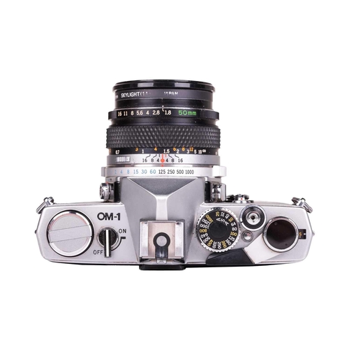 161 - An Olympus Zuiko Digital ED Lens, 50-200mm f2.8-3.5, with front and rear covers, fitted with an Olym... 