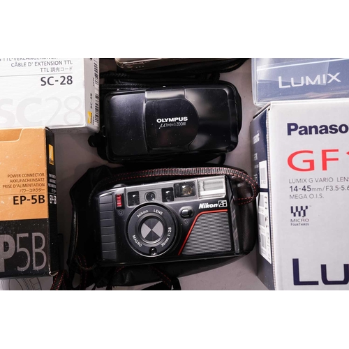 164 - A large collection of boxed cameras and equipment, comprising a Panasonic GF1 Lumix G Vario Lens Kit... 