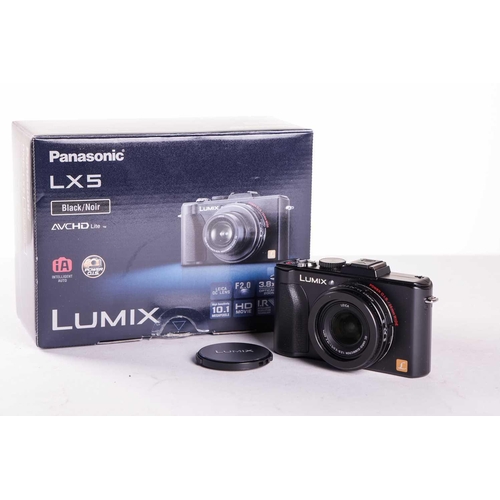 164 - A large collection of boxed cameras and equipment, comprising a Panasonic GF1 Lumix G Vario Lens Kit... 