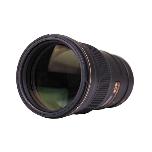 165 - A Nikon Nikkor AF-S 300mm f/4E PF ED VR lens, together with a Nikon AF-S Teleconverter TC-14E II, ea... 