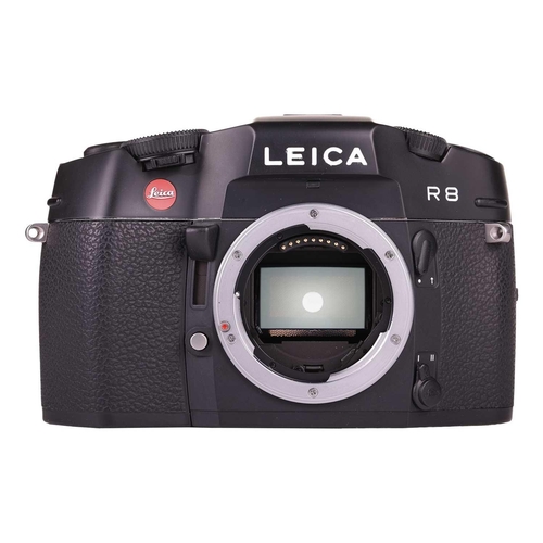 167 - A Leica R8 SLR Camera, 2000, black, serial no. 2476807, in original box with warranty paperwork (now... 