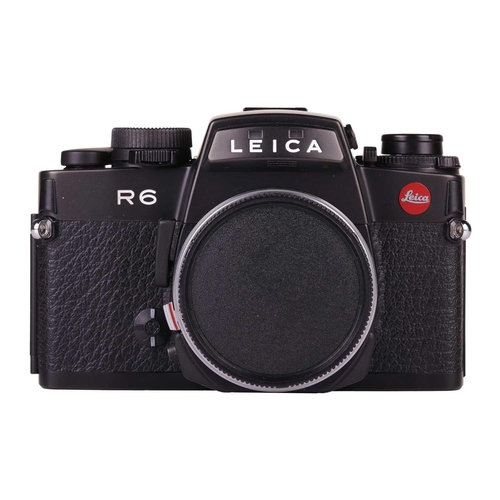 169 - A Leica R6 SLR Camera body, 1987, Made in Germany, black, serial no. 1729282, in original case and b... 