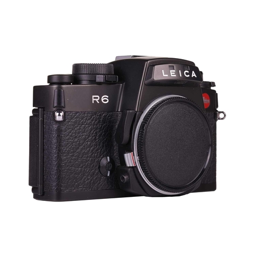 169 - A Leica R6 SLR Camera body, 1987, Made in Germany, black, serial no. 1729282, in original case and b... 