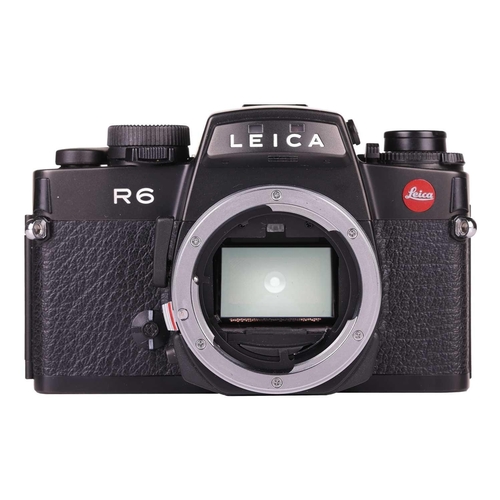 169 - A Leica R6 SLR Camera body, 1987, Made in Germany, black, serial no. 1729282, in original case and b... 