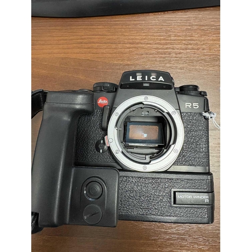 170 - A Leica R5 camera body, black, 1988, serial number 1733870, unboxed, fitted with a Leica Motor-Winde... 