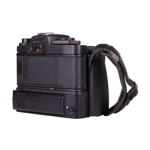 170 - A Leica R5 camera body, black, 1988, serial number 1733870, unboxed, fitted with a Leica Motor-Winde... 