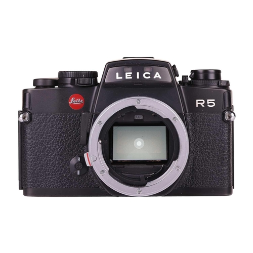 170 - A Leica R5 camera body, black, 1988, serial number 1733870, unboxed, fitted with a Leica Motor-Winde... 