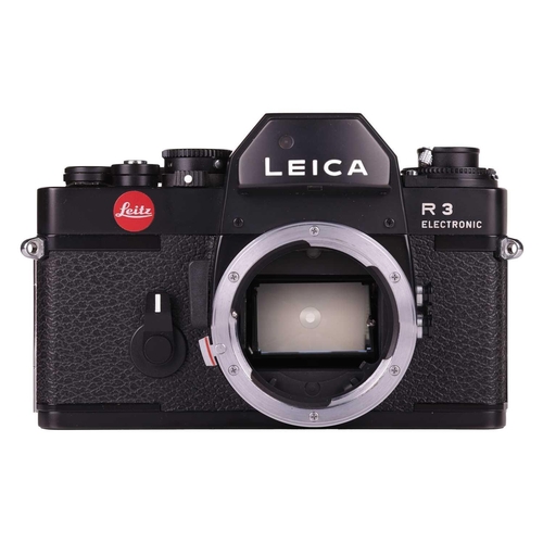 172 - A Leica R3 Electronic Camera body, No.1463715, made in Portugal, in black, with paperwork manual, ta... 