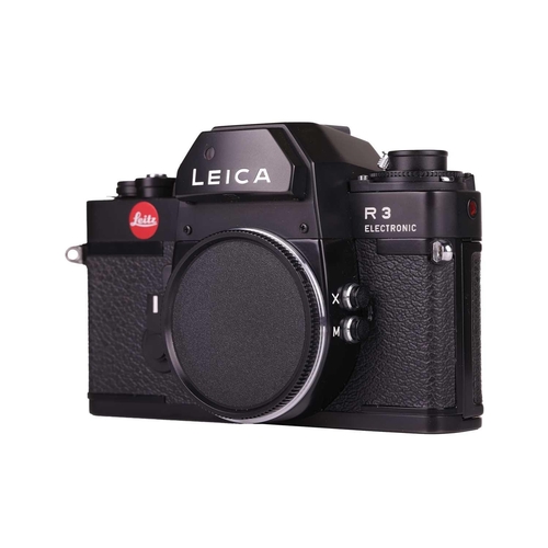 172 - A Leica R3 Electronic Camera body, No.1463715, made in Portugal, in black, with paperwork manual, ta... 