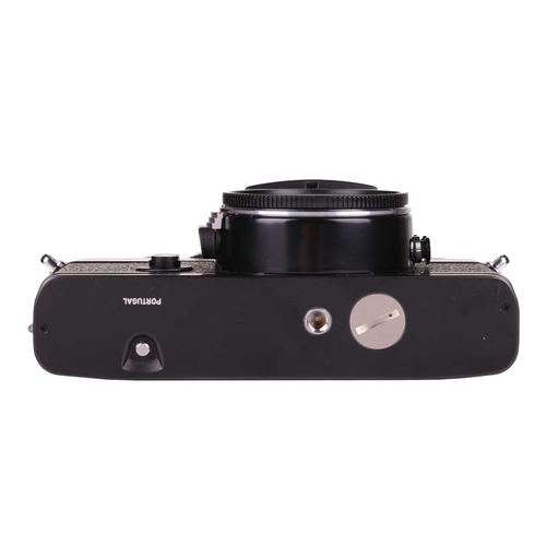 172 - A Leica R3 Electronic Camera body, No.1463715, made in Portugal, in black, with paperwork manual, ta... 