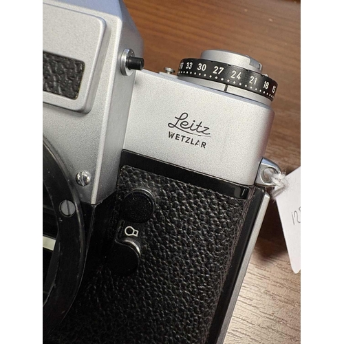 176 - A Leica Leicaflex SL SLR Camera Outfit, late 1960s German, chrome, serial no. 1223828, with original... 