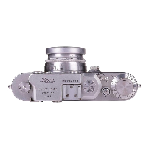 177 - A Leitz Wetzlar Leica IIIa Rangefinder Camera, 1935, serial number 162445, with brown leather Leica ... 