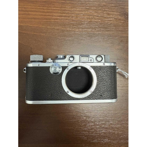 177 - A Leitz Wetzlar Leica IIIa Rangefinder Camera, 1935, serial number 162445, with brown leather Leica ... 