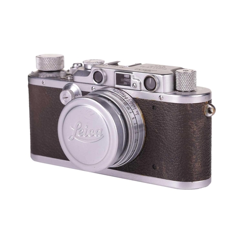 177 - A Leitz Wetzlar Leica IIIa Rangefinder Camera, 1935, serial number 162445, with brown leather Leica ... 