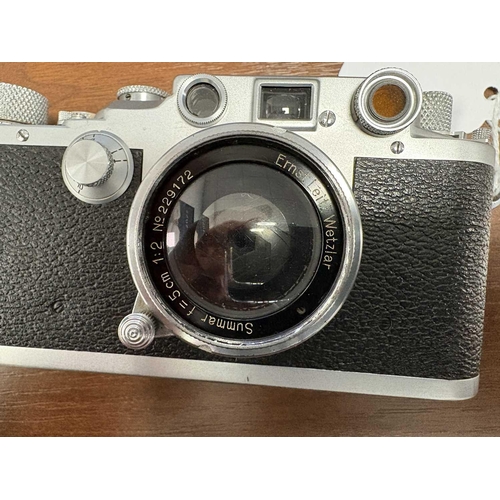 179 - An Ernst Leitz Wetzlar Leica IIIc 35mm Range Finder Camera, 1941/2, serial number 378782, with brown... 