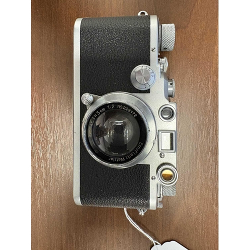 179 - An Ernst Leitz Wetzlar Leica IIIc 35mm Range Finder Camera, 1941/2, serial number 378782, with brown... 