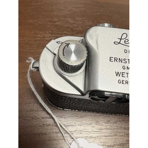 180 - An Ernest Leitz Wetzlar Leica IIIf 35mm rangefinder camera with chrome body, 1956, serial number 814... 