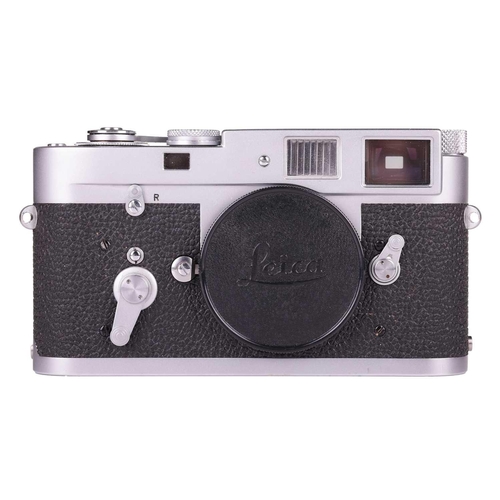 182 - A Leica M2 Rangefinder Camera Body, 1964, chrome, serial number 1092949, with brown leather Leica ca... 