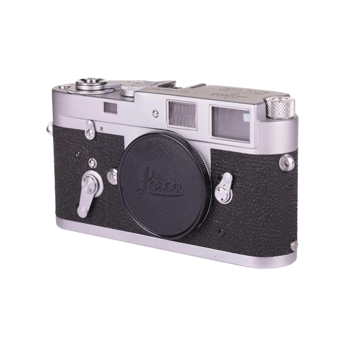 182 - A Leica M2 Rangefinder Camera Body, 1964, chrome, serial number 1092949, with brown leather Leica ca... 