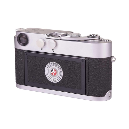 182 - A Leica M2 Rangefinder Camera Body, 1964, chrome, serial number 1092949, with brown leather Leica ca... 