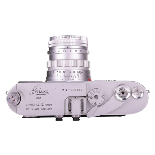 183 - A Leitz Wetzlar Leica M3 Camera, 1960, serial no 996587, with original box and a leather Leica carry... 