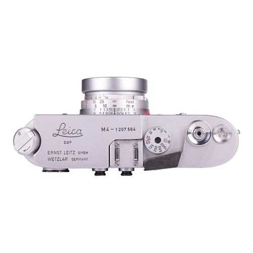 184 - A Leica M4 Rangefinder Camera,1970, chrome, serial no. 1207564, fitted with a Leitz Elmar 1:2.8/50mm... 