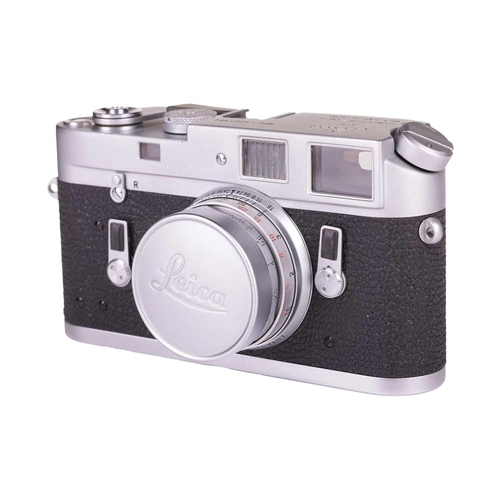 184 - A Leica M4 Rangefinder Camera,1970, chrome, serial no. 1207564, fitted with a Leitz Elmar 1:2.8/50mm... 