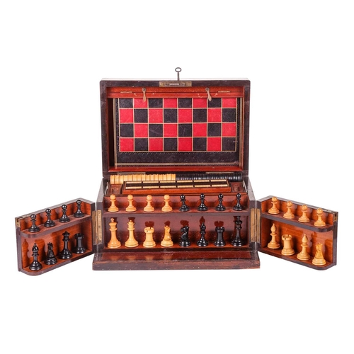 191 - A Victorian rosewood games compendium, with hinged cover and twin front doors, opening to reveal box... 