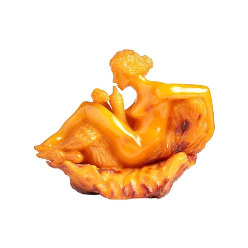 194 - A carved Amber (reconstituted Baltic ?) figure group of Leda & the Swan, 16 cm long x 13 cm high, 33... 