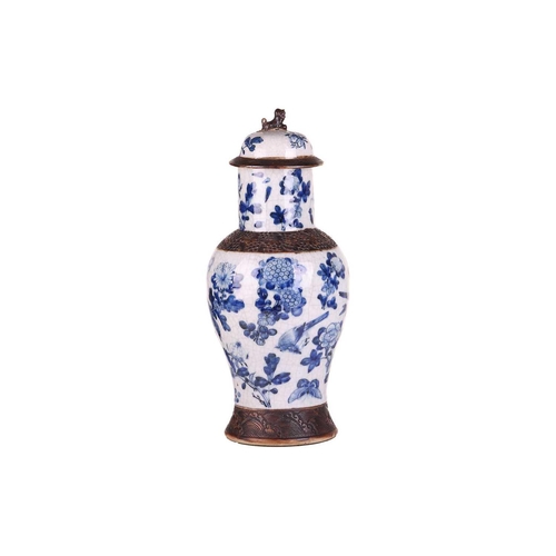 70 - A large Chinese blue and white porcelain baluster vase and cover, late Qing Dynasty/Early Republic, ... 