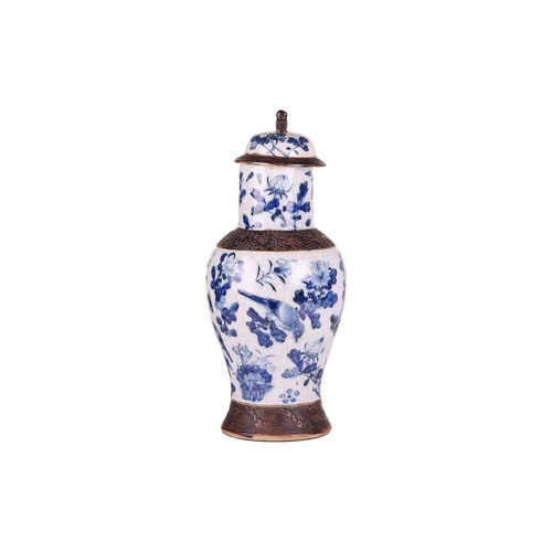 70 - A large Chinese blue and white porcelain baluster vase and cover, late Qing Dynasty/Early Republic, ... 