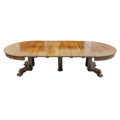 83 - A 19th-century American extending circular mahogany dining table in the manner of Charles Hobe with ... 