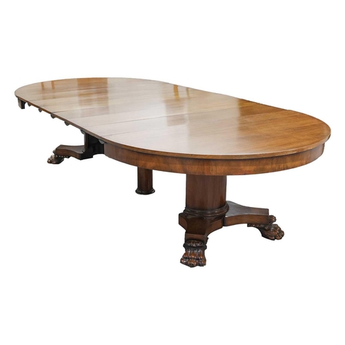 83 - A 19th-century American extending circular mahogany dining table in the manner of Charles Hobe with ... 