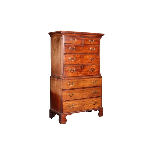 95 - A George III mahogany chest on chest, the upper section with fluted and canted corners with canted, ... 