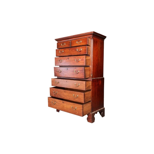 95 - A George III mahogany chest on chest, the upper section with fluted and canted corners with canted, ... 