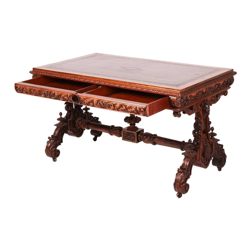 96 - A Victorian exhibition quality, carved rosewood library writing table in the manner of Richard Bridg... 