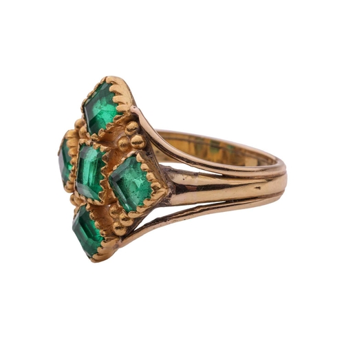 103 - A 19th century Spanish Colonial style emerald dress ring, the lozenge shaped centre set with five mi... 