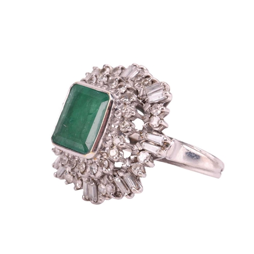 113 - An emerald and diamond ballerina ring, centred with a rectangular portrait-cut emerald with canted c... 