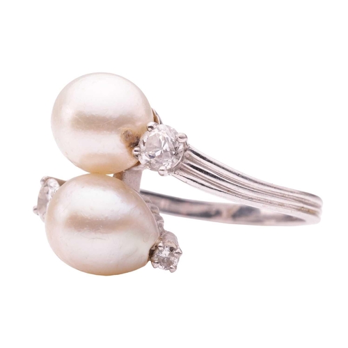 117 - Gübelin - a cultured pearl and diamond crossover ring, comprising two egg-shaped cultured pearls of ... 