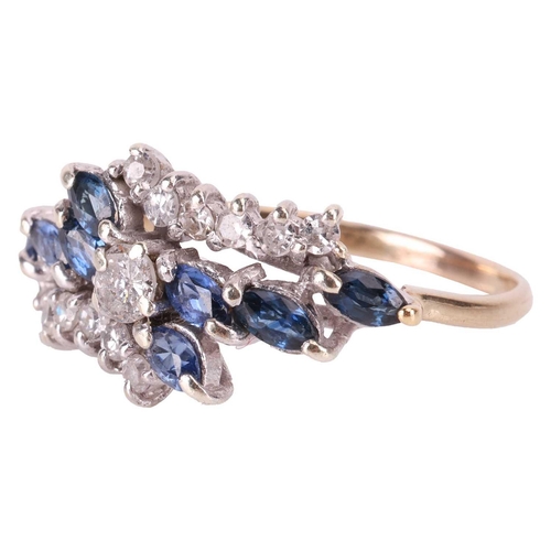 12 - A sapphire and diamond crossover cluster ring, comprising of a central claw-set brilliant-cut diamon... 