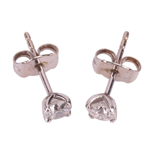 123 - A pair of diamond stud earrings in 18ct white gold, with an estimated total diamond weight of 0.54ct... 