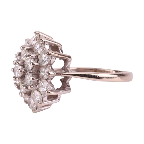 127 - A diamond-set floral cluster ring, featuring nineteen round brilliant cut diamonds, with an estimate... 