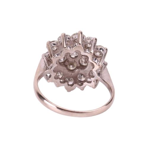 127 - A diamond-set floral cluster ring, featuring nineteen round brilliant cut diamonds, with an estimate... 